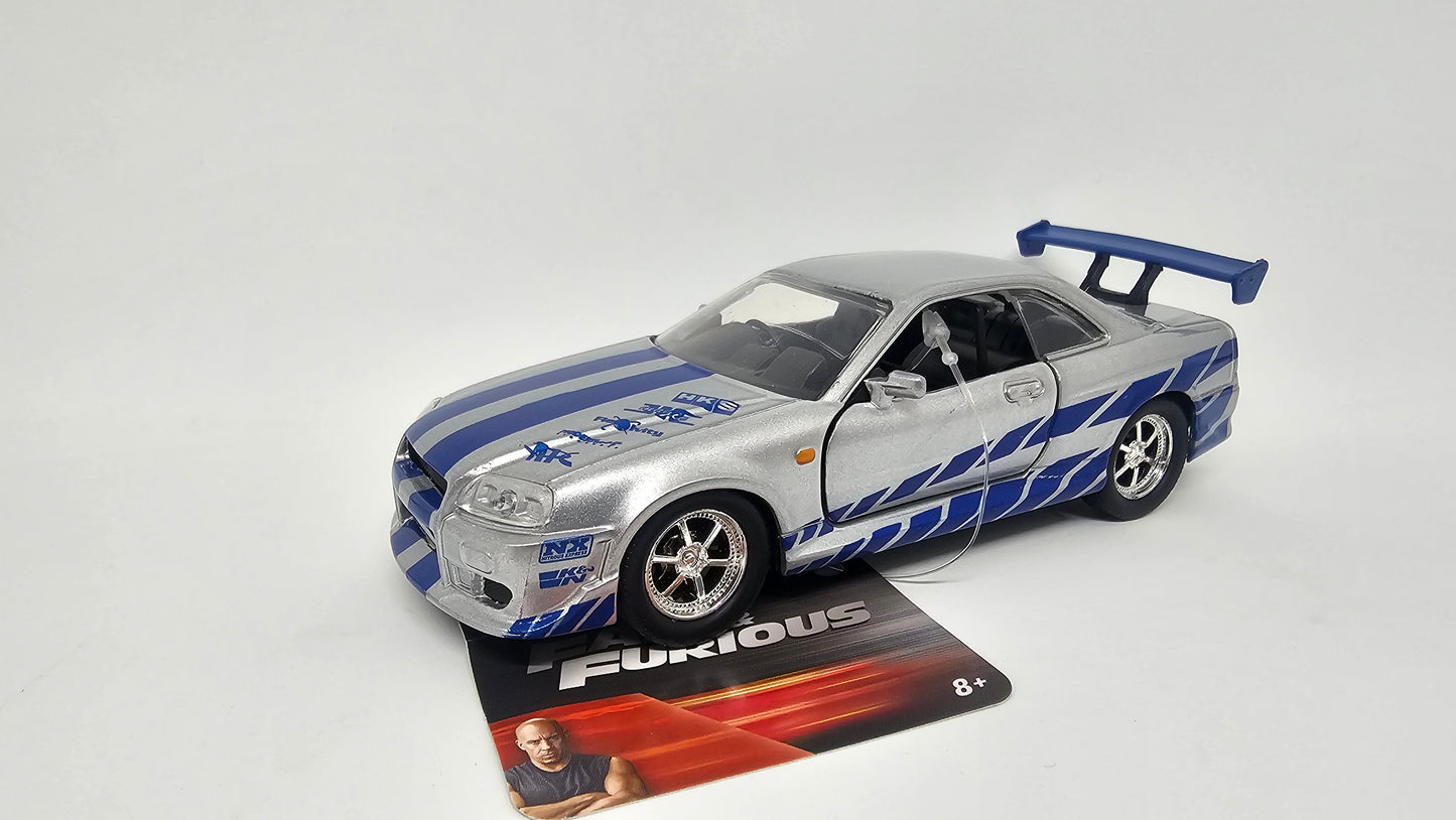 Nissan Skyline GT-R R34 de Brian - "RAPIDO Y FURIOSO 2" - Escala 1/32 - Jada