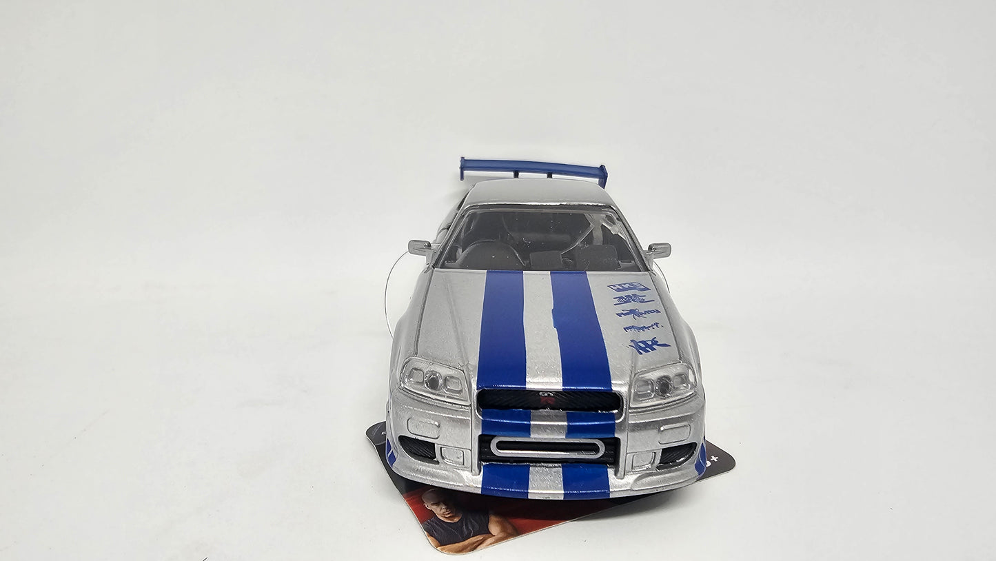 Nissan Skyline GT-R R34 de Brian - "RAPIDO Y FURIOSO 2" - Escala 1/32 - Jada