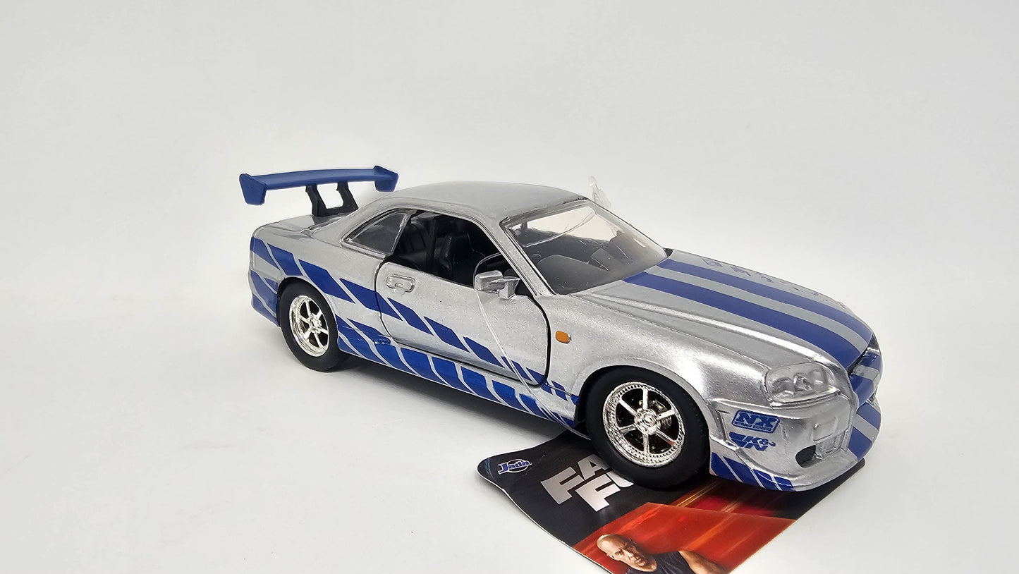 Nissan Skyline GT-R R34 de Brian - "RAPIDO Y FURIOSO 2" - Escala 1/32 - Jada