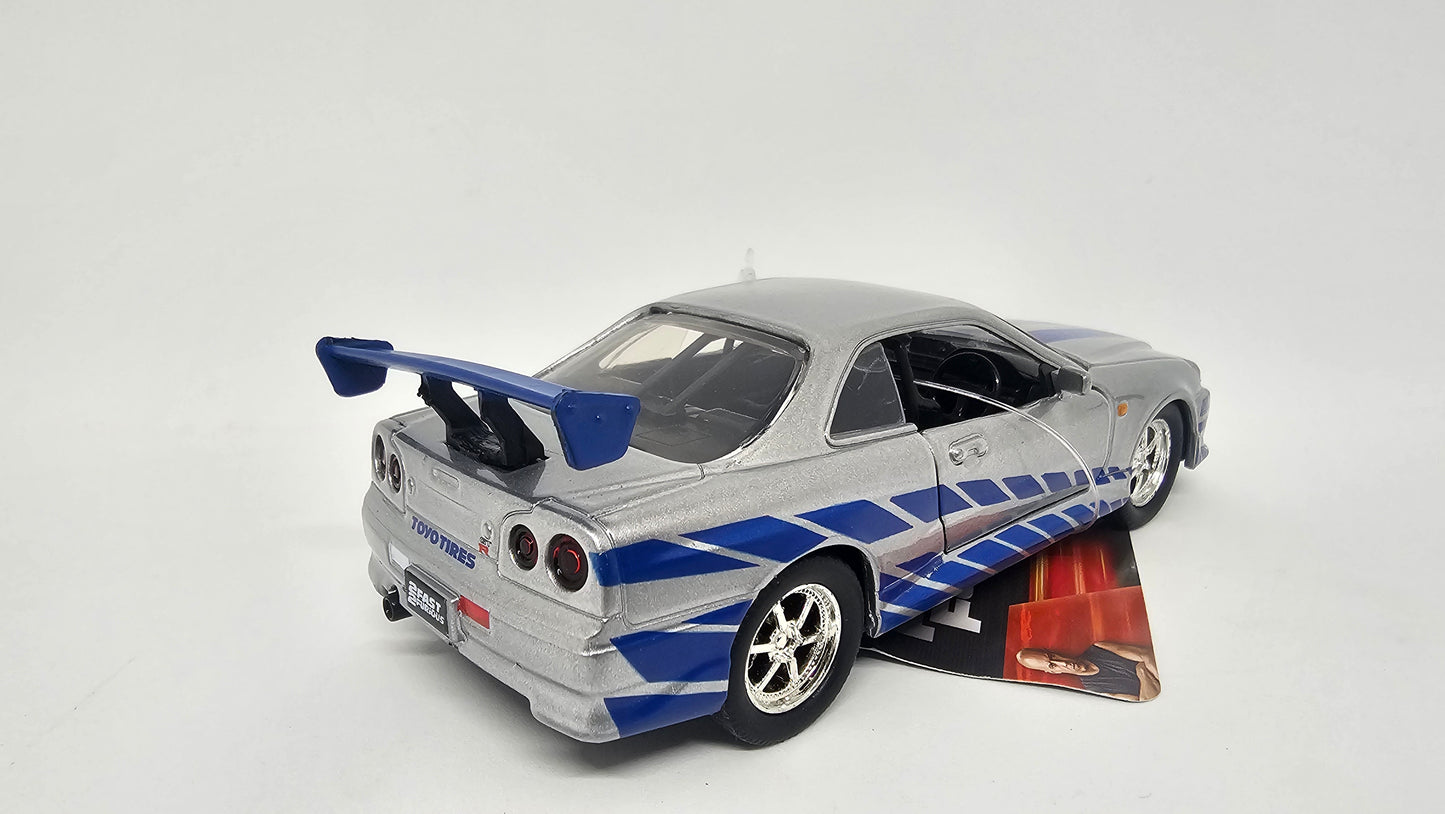 Nissan Skyline GT-R R34 de Brian - "RAPIDO Y FURIOSO 2" - Escala 1/32 - Jada