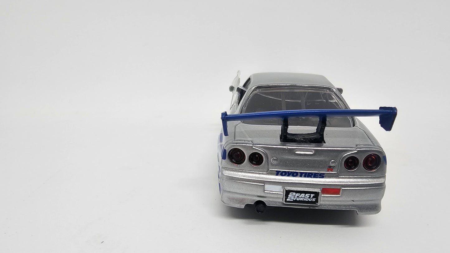 Nissan Skyline GT-R R34 de Brian - "RAPIDO Y FURIOSO 2" - Escala 1/32 - Jada