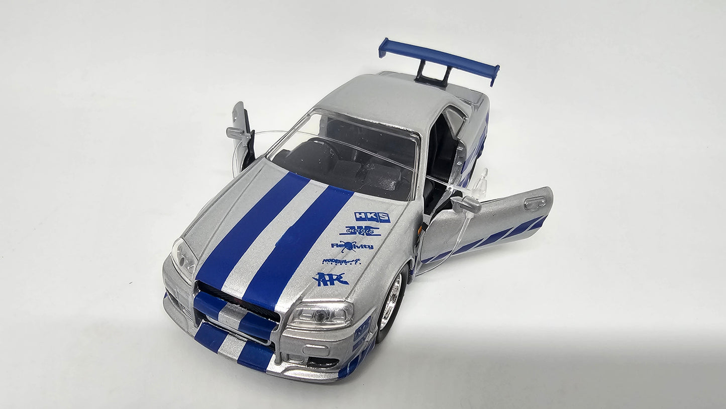 Nissan Skyline GT-R R34 de Brian - "RAPIDO Y FURIOSO 2" - Escala 1/32 - Jada