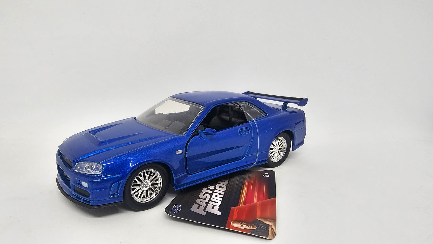 Nissan Skyline GT-R R34 2002 de Brian O´Conner - "RAPIDO Y FURIOSO" - Escala 1/32 - Jada