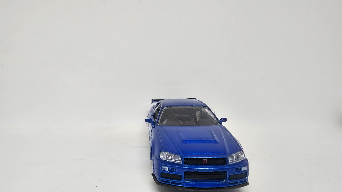 Nissan Skyline GT-R R34 2002 de Brian O´Conner - "RAPIDO Y FURIOSO" - Escala 1/32 - Jada