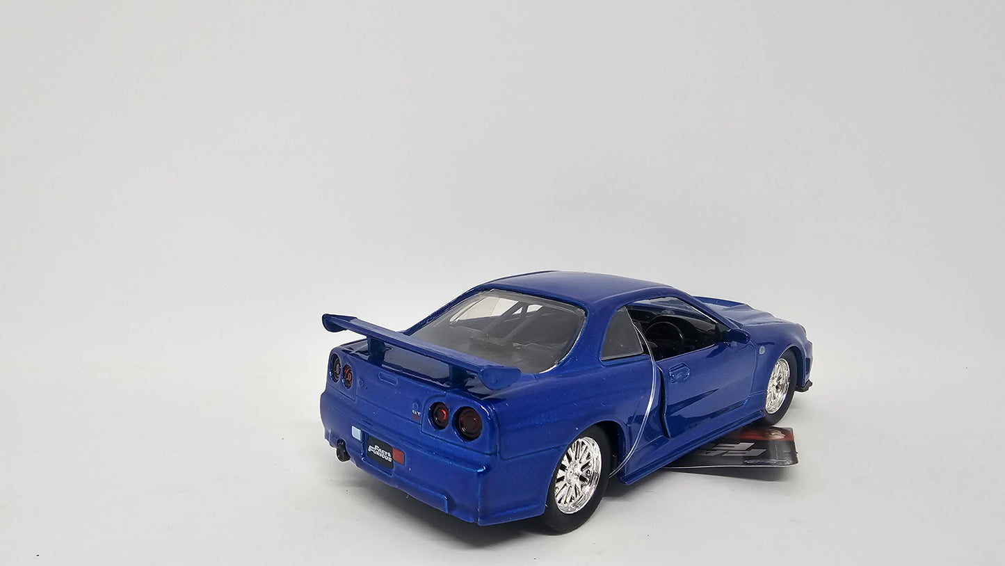 Nissan Skyline GT-R R34 2002 de Brian O´Conner - "RAPIDO Y FURIOSO" - Escala 1/32 - Jada