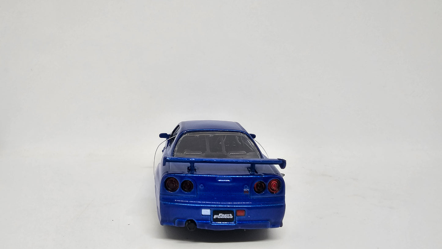 Nissan Skyline GT-R R34 2002 de Brian O´Conner - "RAPIDO Y FURIOSO" - Escala 1/32 - Jada