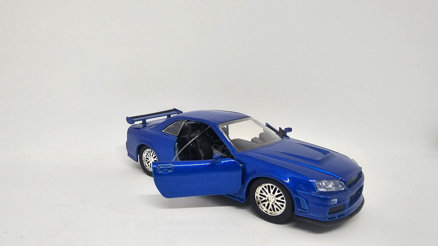 Nissan Skyline GT-R R34 2002 de Brian O´Conner - "RAPIDO Y FURIOSO" - Escala 1/32 - Jada