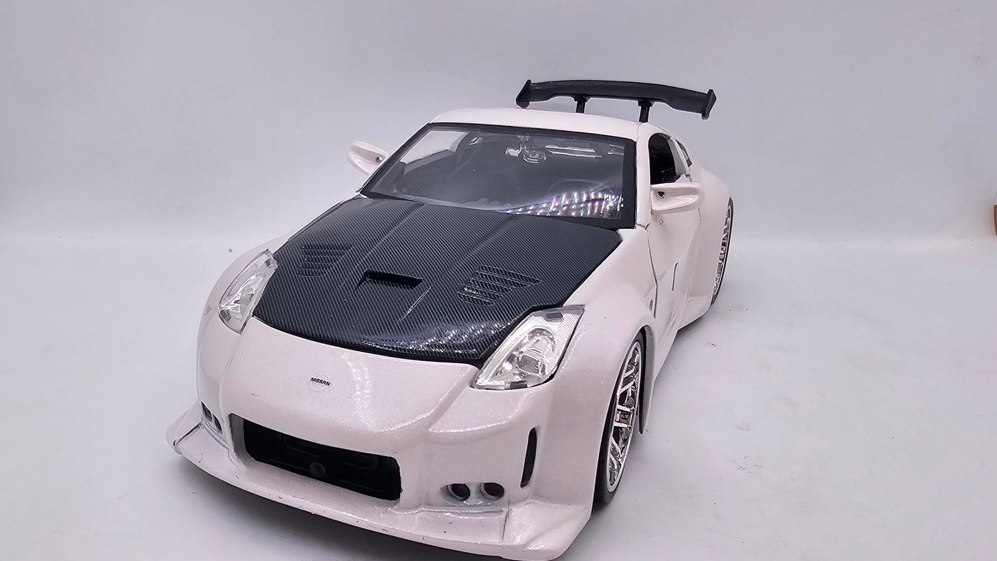 Nissan 350Z (Z33) 2003 - Escala 1/24 - Jada (sin caja)