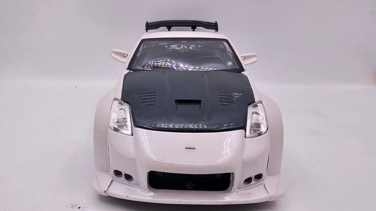 Nissan 350Z (Z33) 2003 - Escala 1/24 - Jada (sin caja)