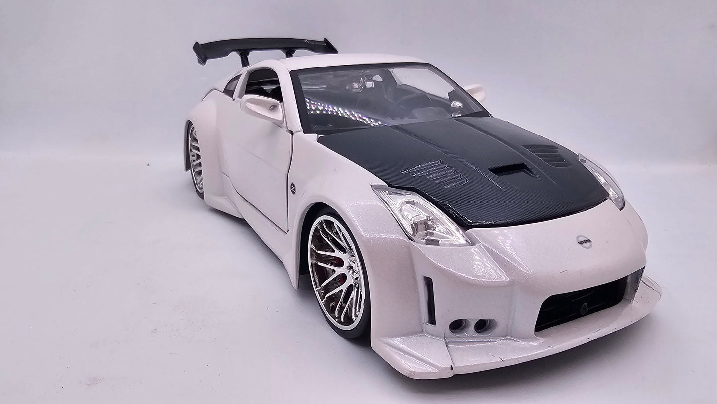 Nissan 350Z (Z33) 2003 - Escala 1/24 - Jada (sin caja)