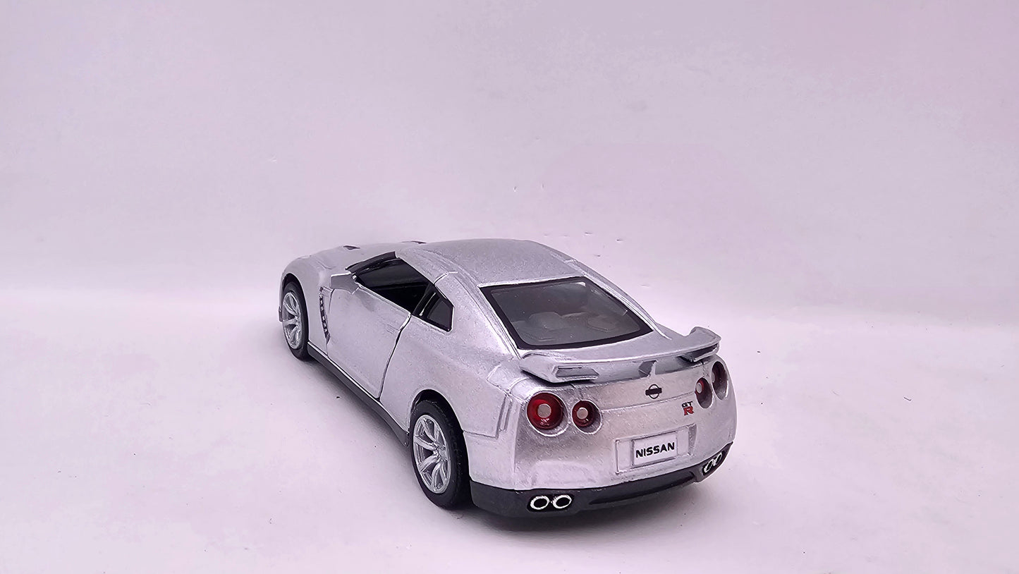 Nissan GT-R R35 2009 - Escala 1/36 - Kinsmart - (Sin caja)