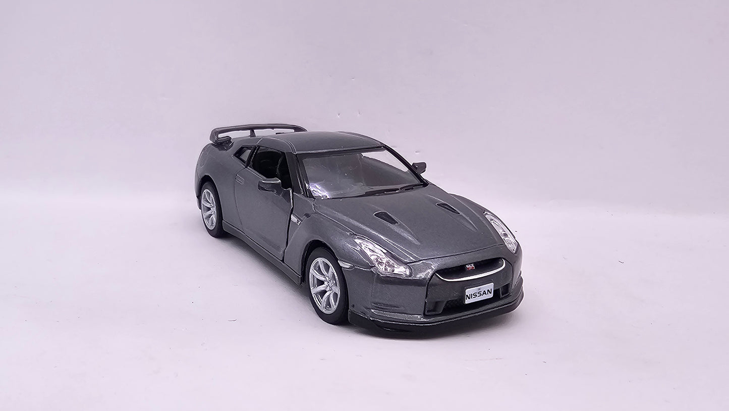 Nissan GT-R R35 2009 - Escala 1/36 - Kinsmart - (Sin caja)