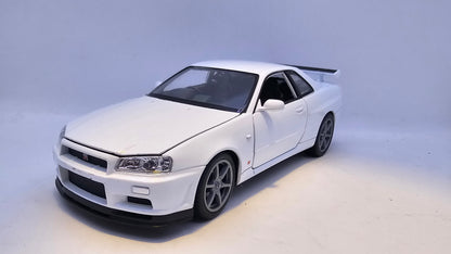 Nissan Skyline GT-R R34 - Escala 1/24 - Welly - (Sin caja)