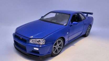 Nissan Skyline GT-R R34 - Escala 1/24 - Welly - (Sin caja)