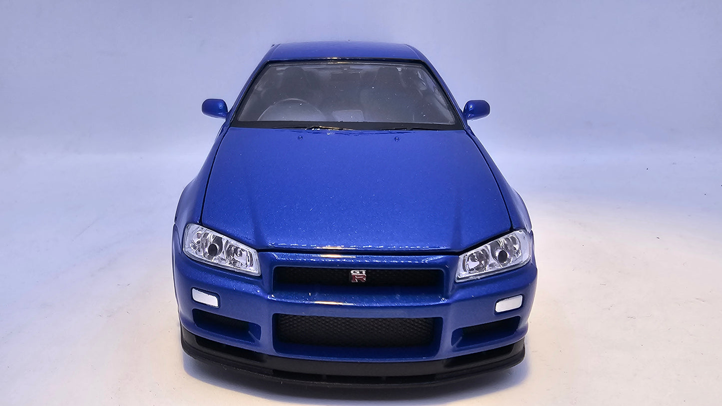 Nissan Skyline GT-R R34 - Escala 1/24 - Welly - (Sin caja)