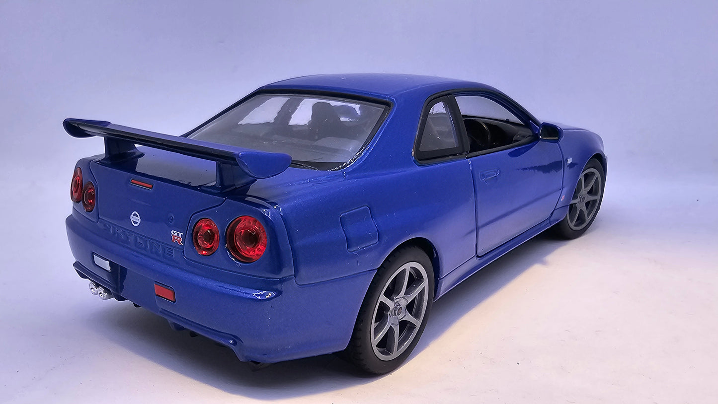 Nissan Skyline GT-R R34 - Escala 1/24 - Welly - (Sin caja)