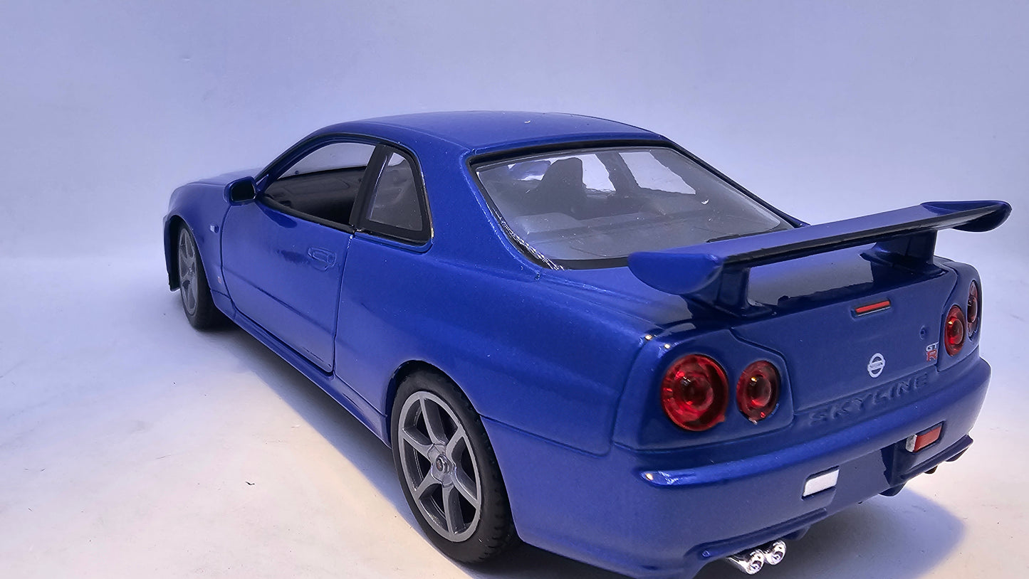 Nissan Skyline GT-R R34 - Escala 1/24 - Welly - (Sin caja)