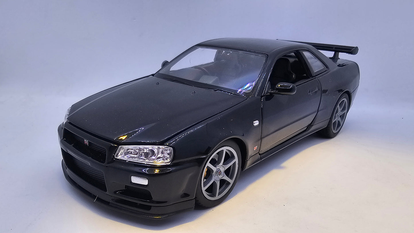 Nissan Skyline GT-R R34 - Escala 1/24 - Welly - (Sin caja)