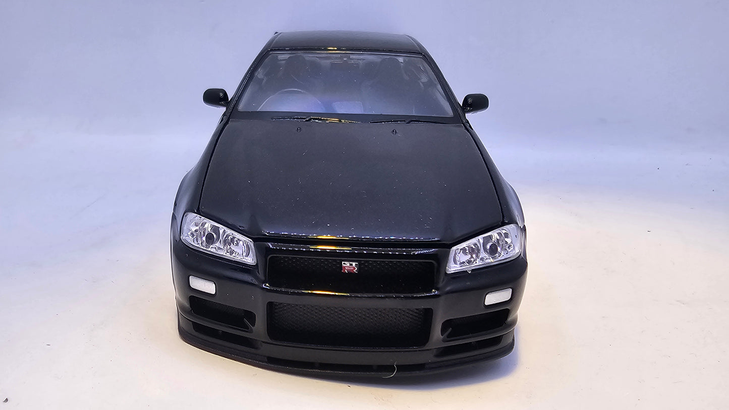 Nissan Skyline GT-R R34 - Escala 1/24 - Welly - (Sin caja)