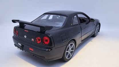 Nissan Skyline GT-R R34 - Escala 1/24 - Welly - (Sin caja)