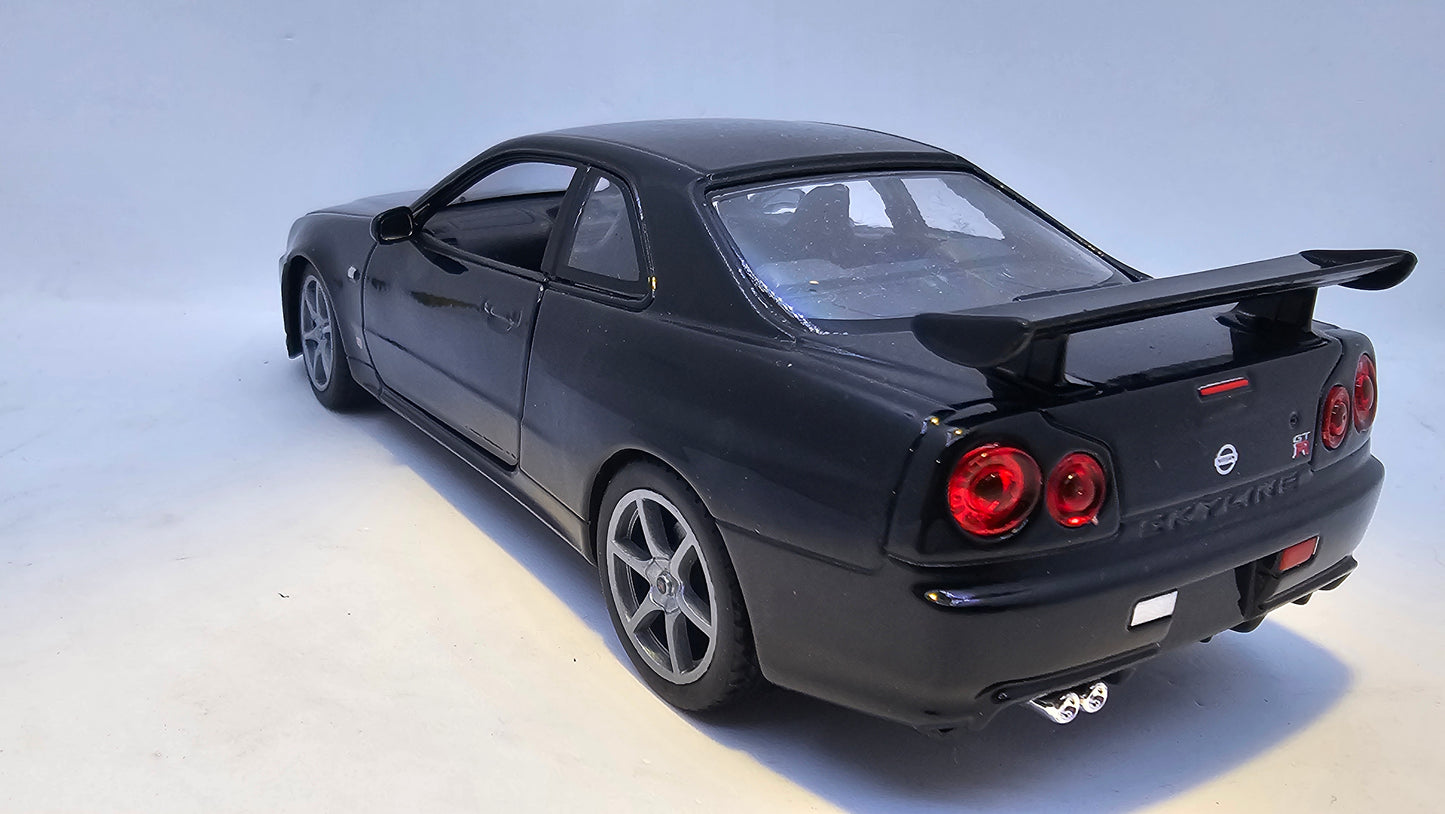 Nissan Skyline GT-R R34 - Escala 1/24 - Welly - (Sin caja)