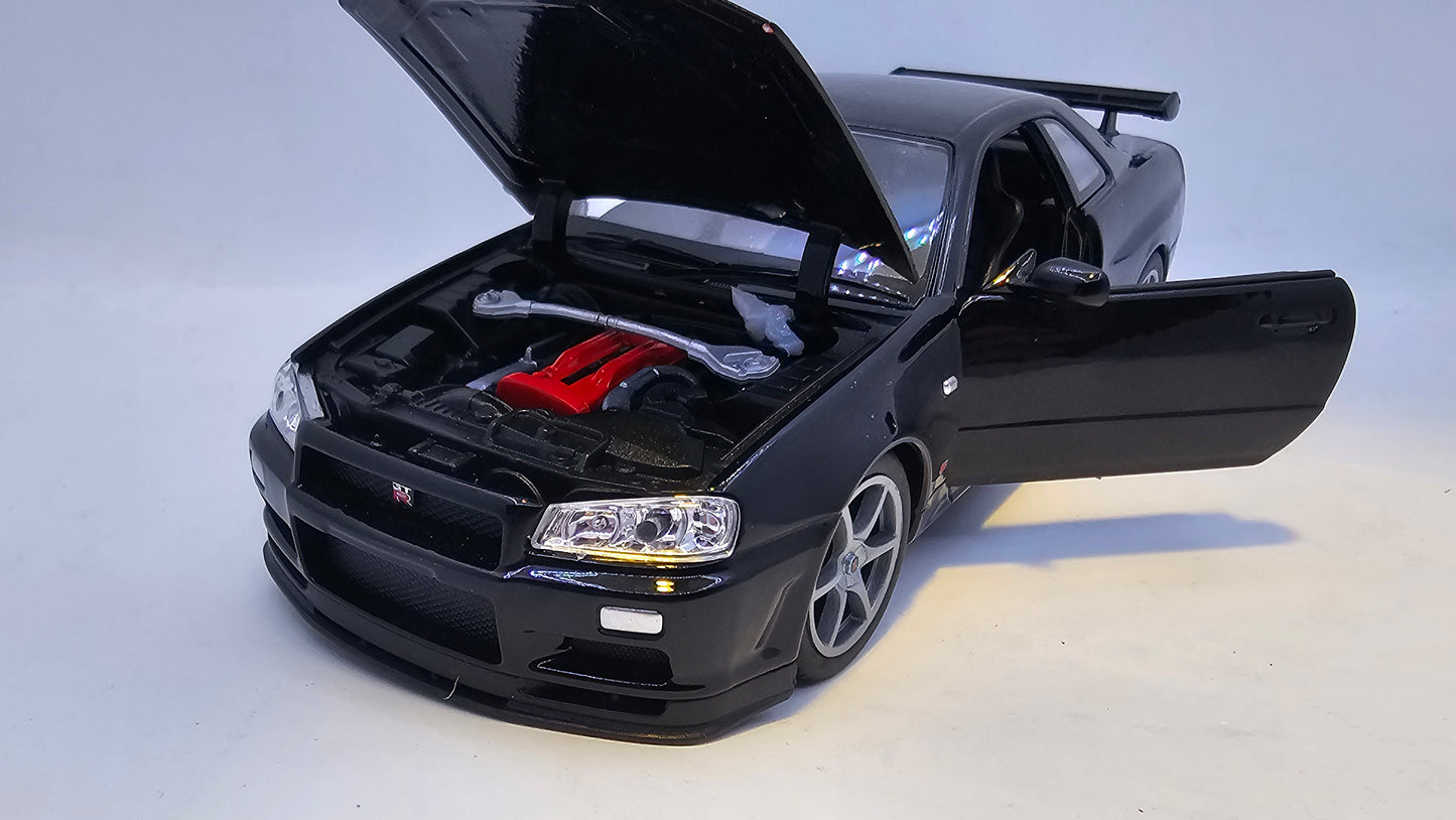 Nissan Skyline GT-R R34 - Escala 1/24 - Welly - (Sin caja)