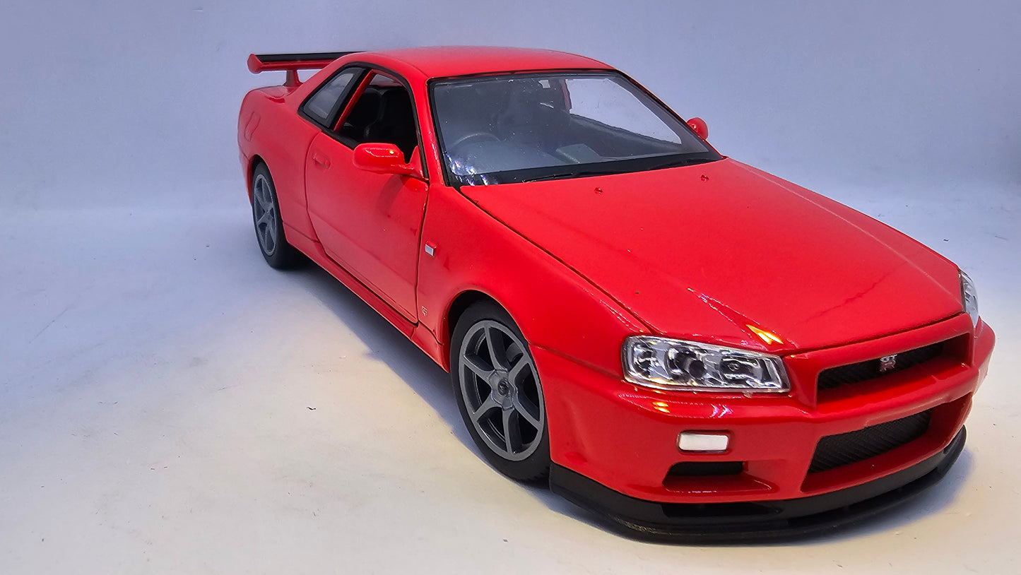 Nissan Skyline GT-R R34 - Escala 1/24 - Welly - (Sin caja)