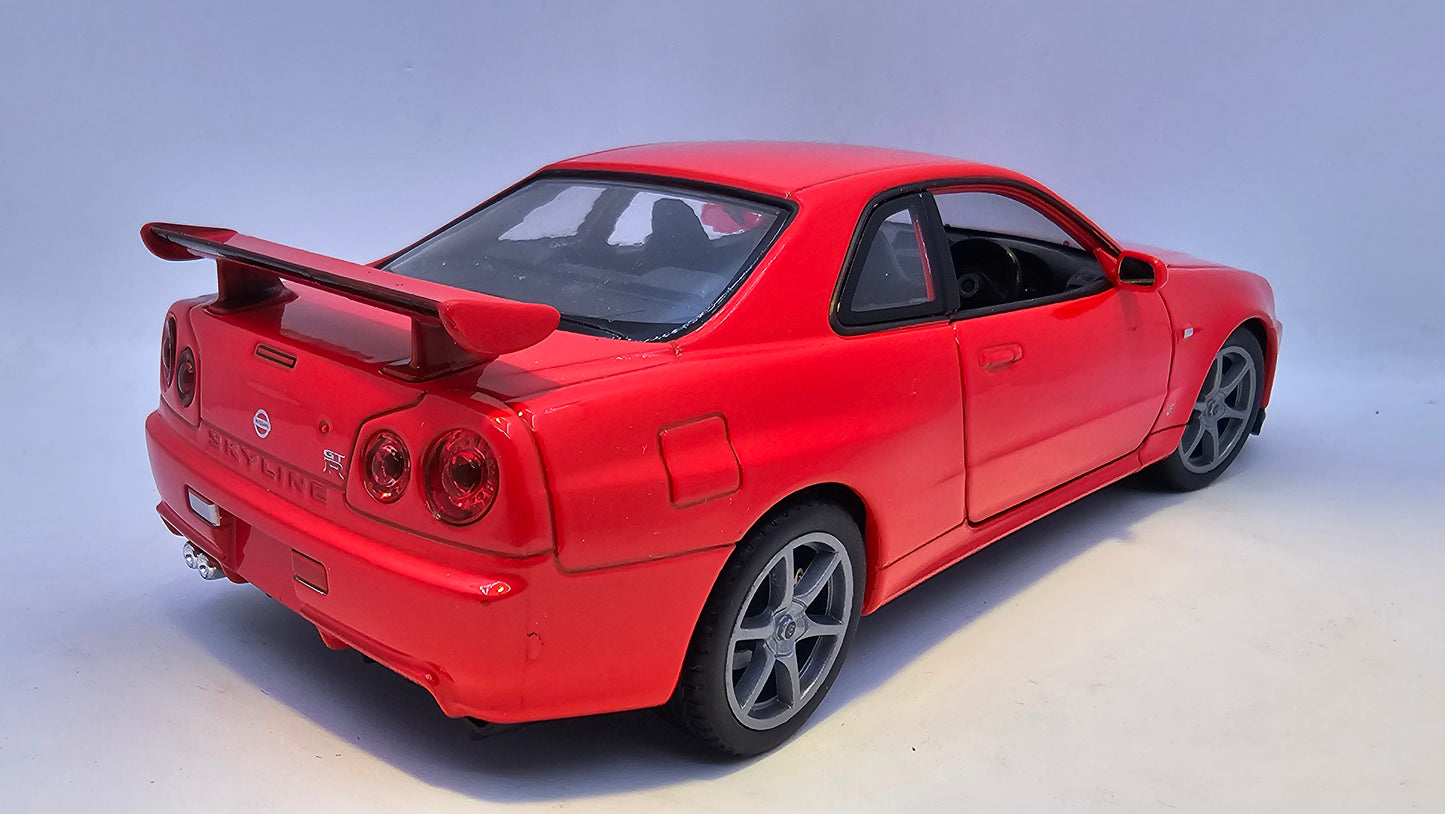 Nissan Skyline GT-R R34 - Escala 1/24 - Welly - (Sin caja)