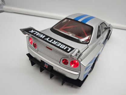 Nissan Skyline GT-R R34 Liberty Walk de Rapido y Furioso - Escala 1/24 - c/Luz y Sonido - (sin caja)