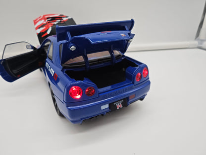 Nissan Skyline GT-R R34 Nismo - Escala 1/24 - c/Luz y Sonido - (sin caja)