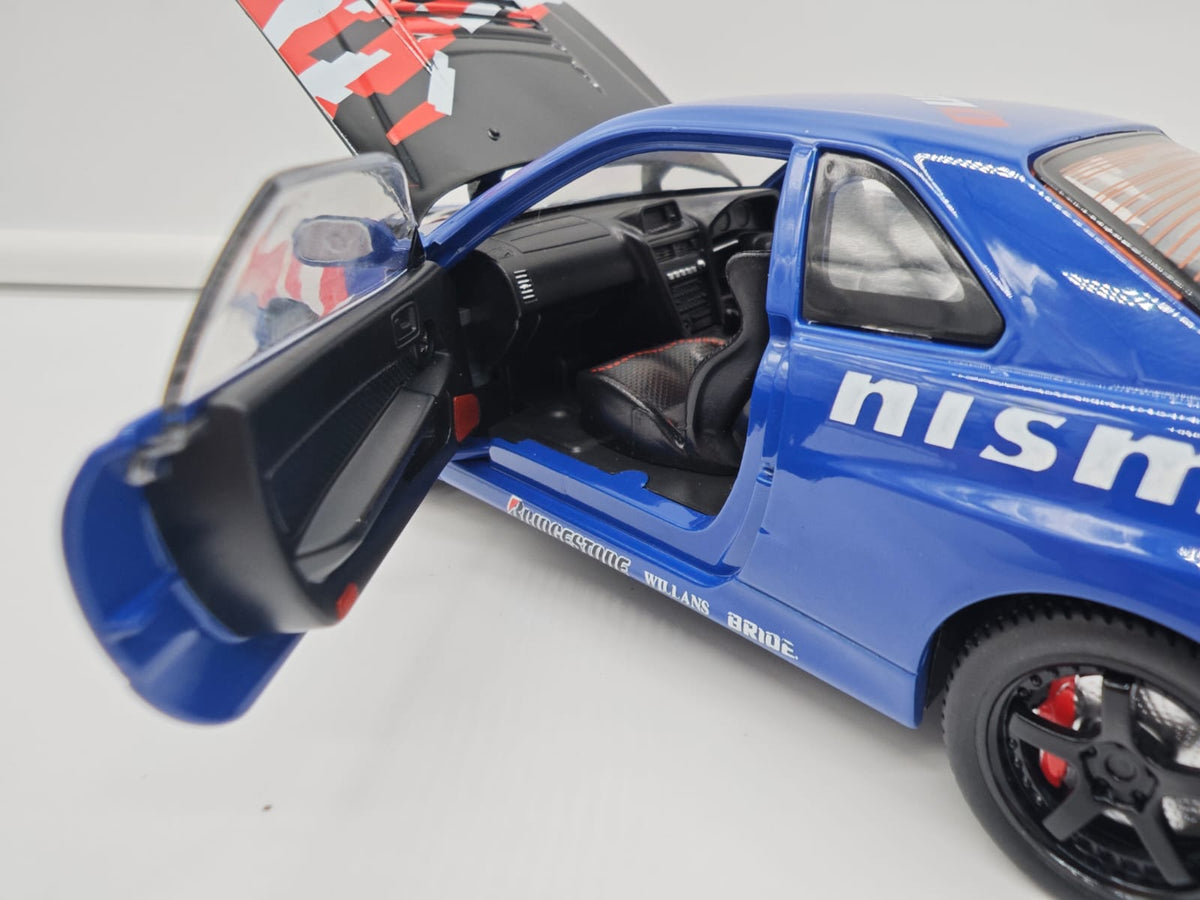 Nissan Skyline GT-R R34 Nismo - Escala 1/24 - c/Luz y Sonido - (sin caja)