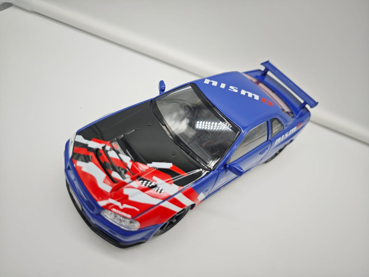 Nissan Skyline GT-R R34 Nismo - Escala 1/24 - c/Luz y Sonido - (sin caja)