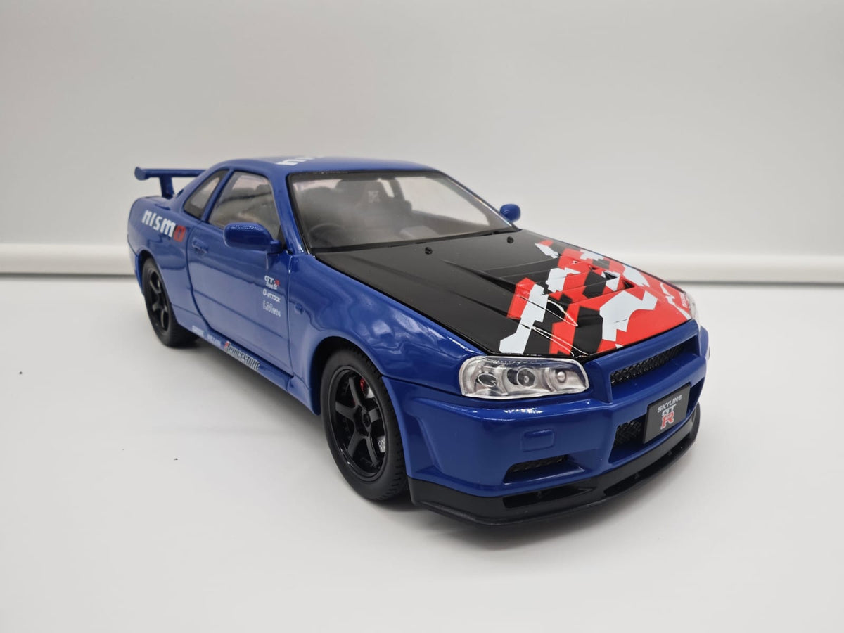 Nissan Skyline GT-R R34 Nismo - Escala 1/24 - c/Luz y Sonido - (sin caja)