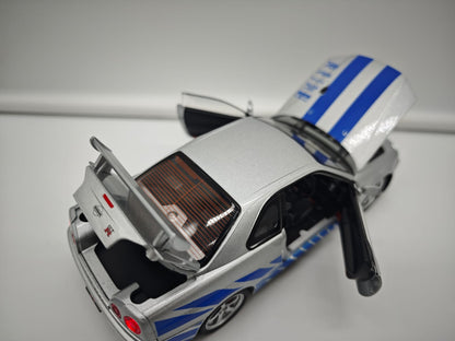 Nissan Skyline GT-R R34 2002 Brian O'Conner Rapido y Furioso - Escala 1/24 - c/Luz y Sonido - (sin caja)