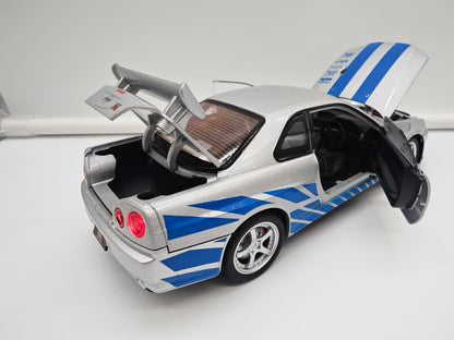 Nissan Skyline GT-R R34 2002 Brian O'Conner Rapido y Furioso - Escala 1/24 - c/Luz y Sonido - (sin caja)
