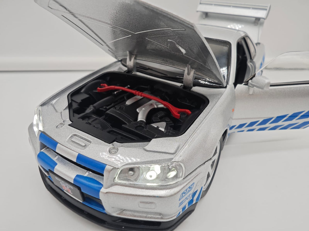 Nissan Skyline GT-R R34 2002 Brian O'Conner Rapido y Furioso - Escala 1/24 - c/Luz y Sonido - (sin caja)