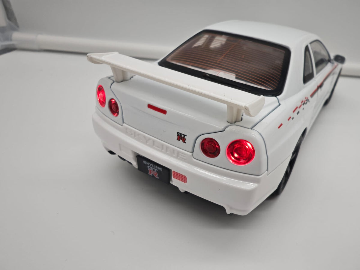 Nissan Skyline GT-R R34 Nismo - Escala 1/24 - c/Luz y Sonido - (sin caja)