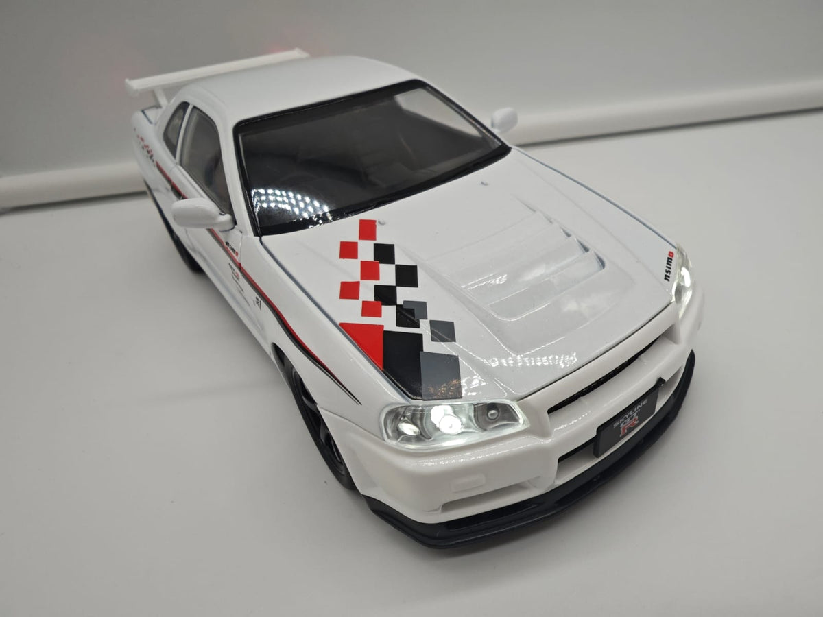 Nissan Skyline GT-R R34 Nismo - Escala 1/24 - c/Luz y Sonido - (sin caja)