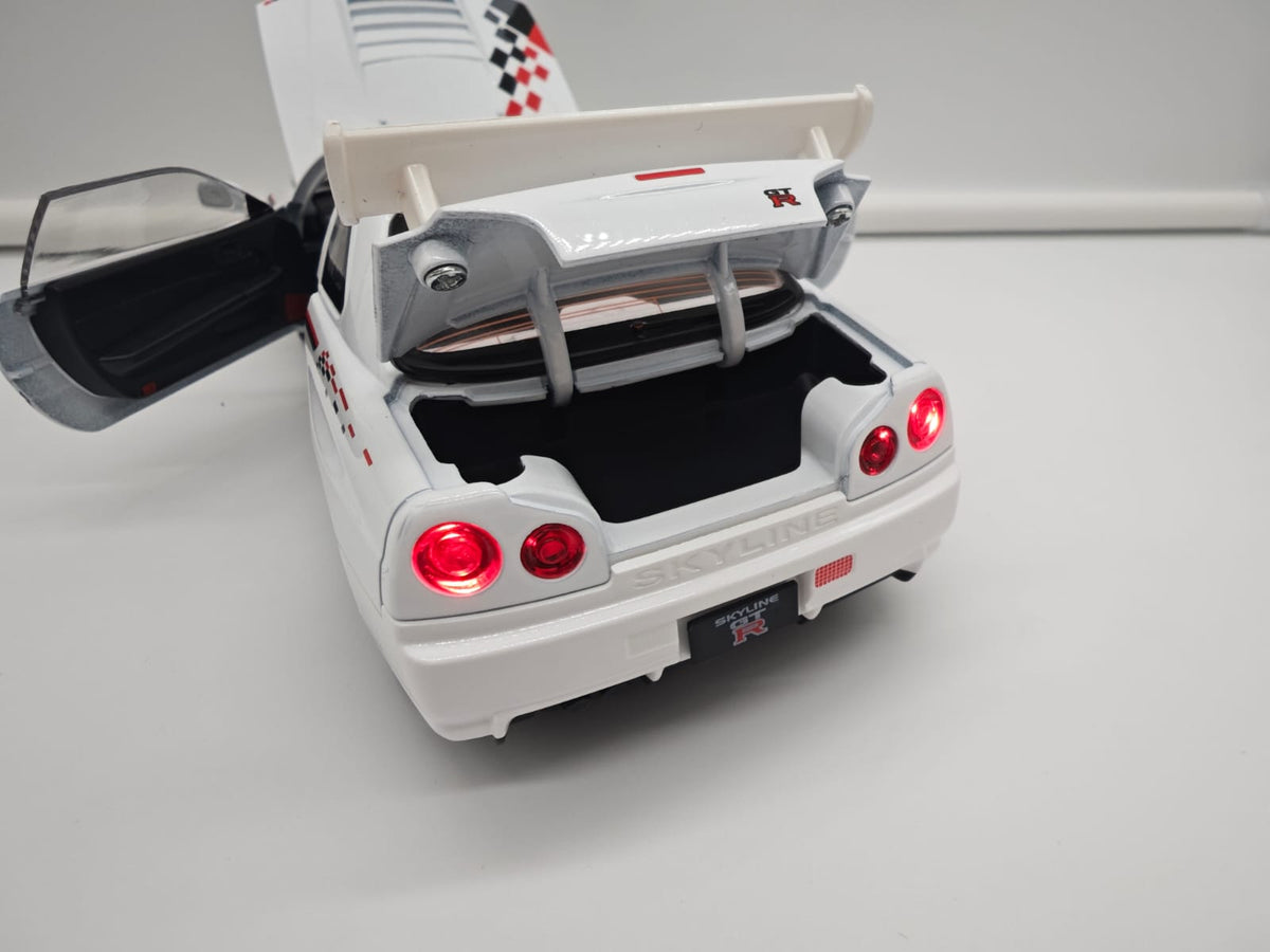 Nissan Skyline GT-R R34 Nismo - Escala 1/24 - c/Luz y Sonido - (sin caja)