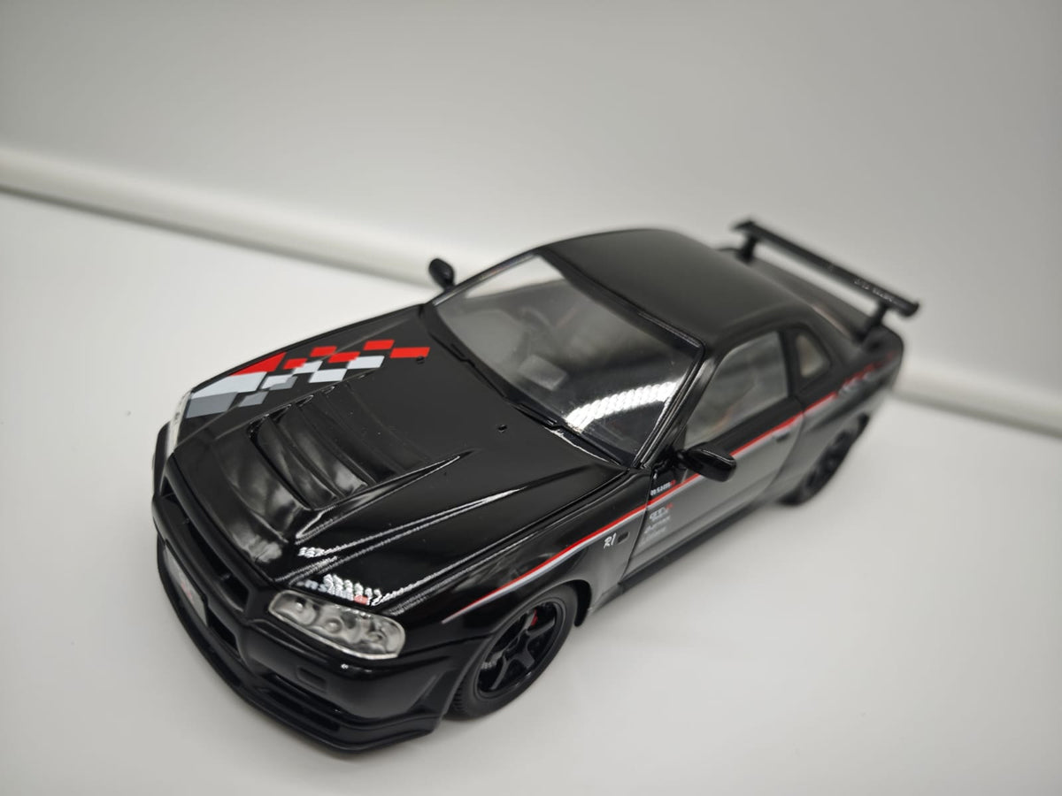 Nissan Skyline GT-R R34 Nismo - Escala 1/24 - c/Luz y Sonido - (sin caja)